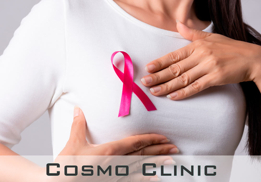 Kvinne med rosa sløyfe: Brystrekonstruksjon etter brystkreft Brystrekonstruksjon brystkreft rosa sløyfe